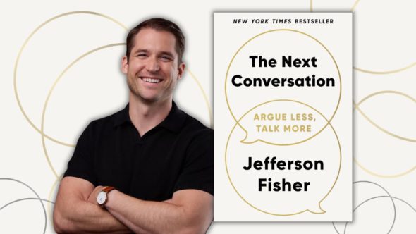 Author Jefferson Fisher smiling with a black button up t-shirt. Features the book cover of The Next Conversation by Jefferson Fisher.